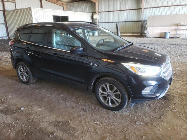 Photo 4 from auction – 2017 FORD ESCAPE SE with VIN 1FMCU0G96HUA30030