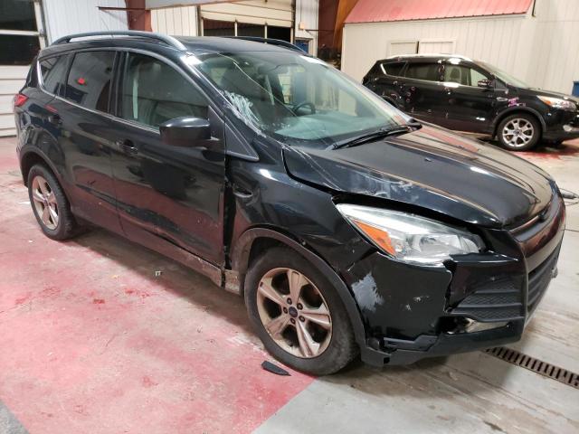 Photo 4 from auction – 2014 FORD ESCAPE SE with VIN 1FMCU9G92EUE05301