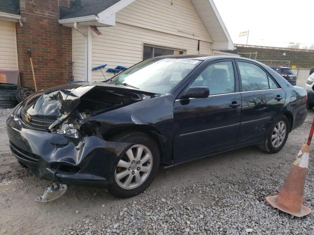 TOYOTA CAMRY 2003 with VIN 4T1BE30KX3U124282 - Photo from auction