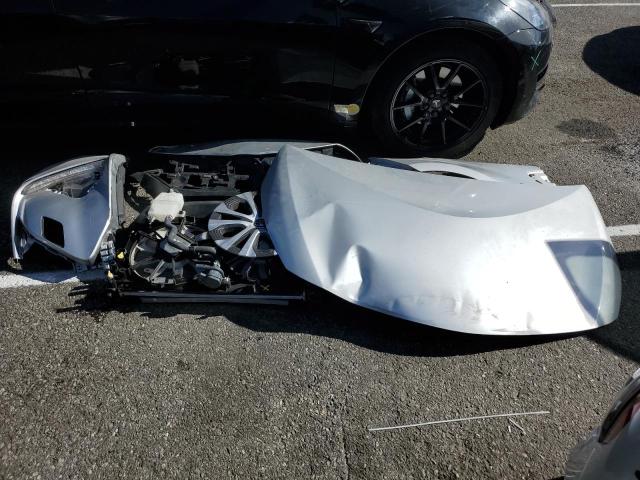 Photo 12 from auction – 2021 TOYOTA PRIUS PRIM with VIN JTDKAMFP2M3180197