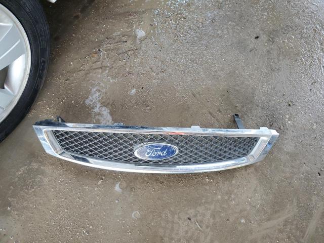 Photo 12 from auction – 2007 FORD FOCUS ZX3 with VIN 1FAHP31N97W105191