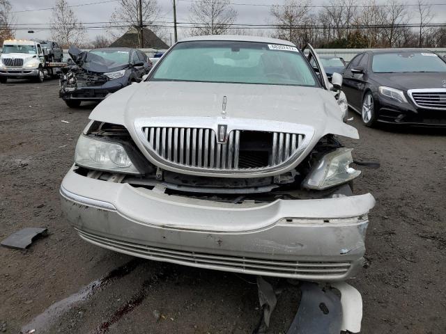 Photo 5 from auction – 2004 LINCOLN TOWN CAR E with VIN 1LNHM81W44Y619597