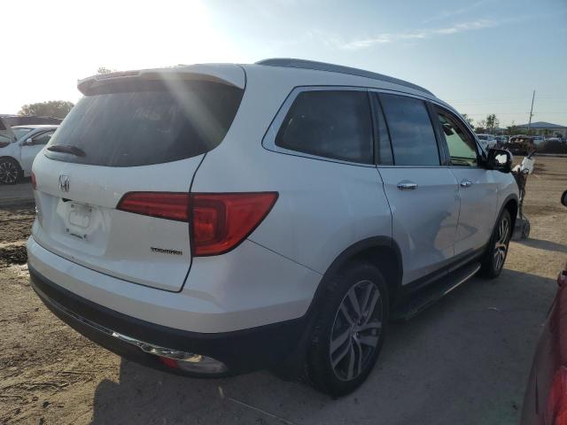 Photo 3 from auction – 2017 HONDA PILOT TOUR with VIN 5FNYF5H98HB021337