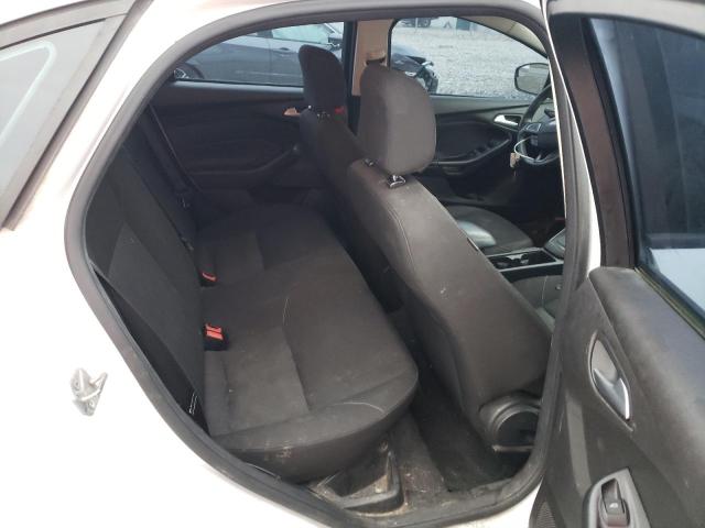 Photo 10 from auction – 2015 FORD FOCUS SE with VIN 1FADP3F24FL296029