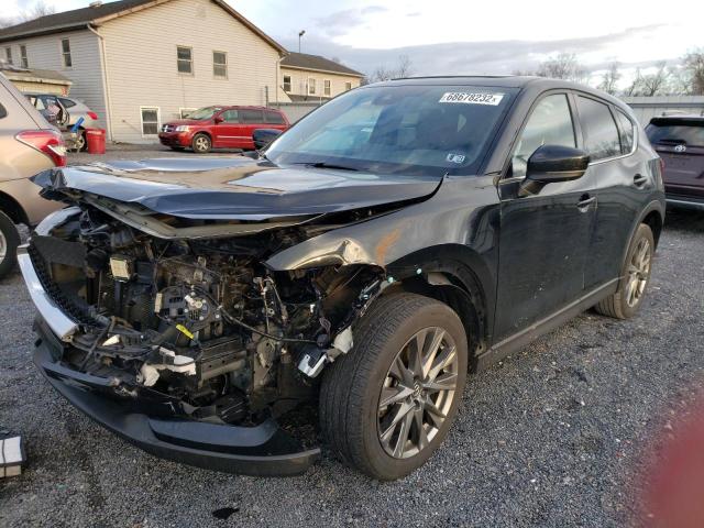 MAZDA CX-5 SIGNA 2021 with VIN JM3KFBEY9M0321226 - Photo from auction