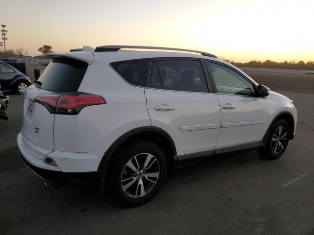 Photo 3 from auction – 2017 TOYOTA RAV4 XLE with VIN JTMRFREV1HJ708262