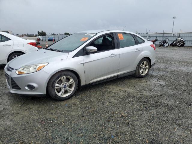FORD FOCUS SE 2014 with VIN 1FADP3F20EL239292 - Photo from auction