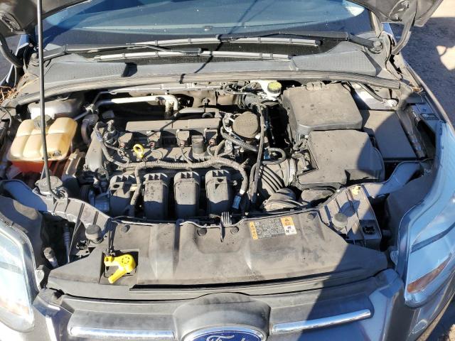 Photo 11 from auction – 2014 FORD FOCUS SE with VIN 1FADP3F20EL414012