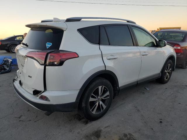 Photo 3 from auction – 2016 TOYOTA RAV4 XLE with VIN JTMWFREV4GJ080022