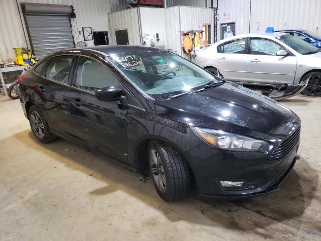 Photo 4 from auction – 2018 FORD FOCUS SE with VIN 1FADP3FEXJL329196