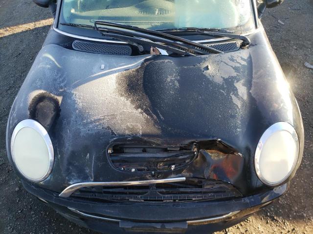 Photo 11 from auction – 2005 MINI COOPER S with VIN WMWRE33555TL14439