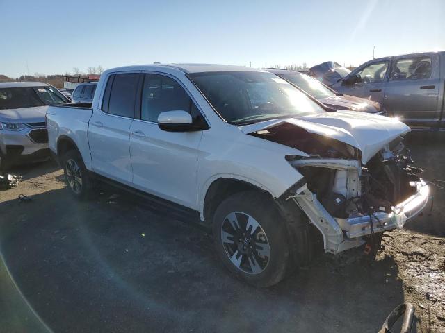 Photo 4 from auction – 2020 HONDA RIDGELINE with VIN 5FPYK3F53LB028664