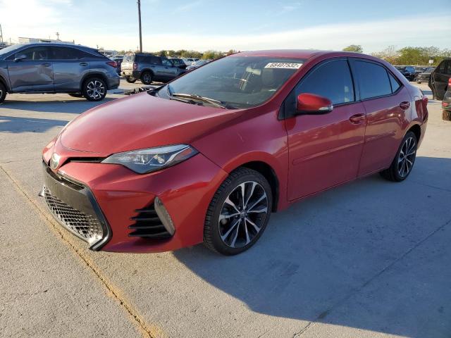 TOYOTA COROLLA L 2018 with VIN 5YFBURHE7JP786906 - Photo from auction