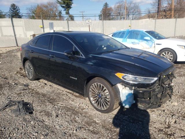 Photo 4 from auction – 2018 FORD FUSION TIT with VIN 3FA6P0RU7JR101507