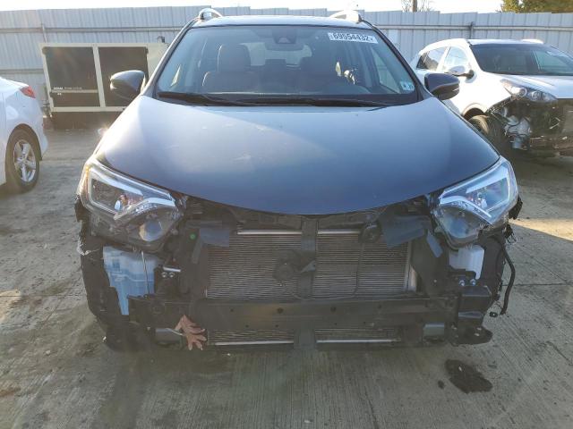 Photo 5 from auction – 2018 TOYOTA RAV4 LIMIT with VIN JTMDFREV7JD243548