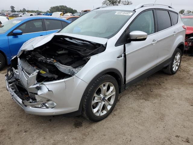 FORD ESCAPE TIT 2014 with VIN 1FMCU0JX7EUC42311 - Photo from auction