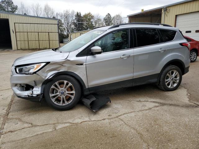 FORD ESCAPE SE 2018 with VIN 1FMCU0GD6JUD57134 - Photo from auction