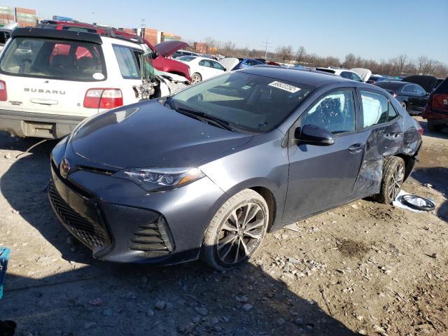 TOYOTA COROLLA 2018 with VIN 5YFBURHE3JP814605 - Photo from auction