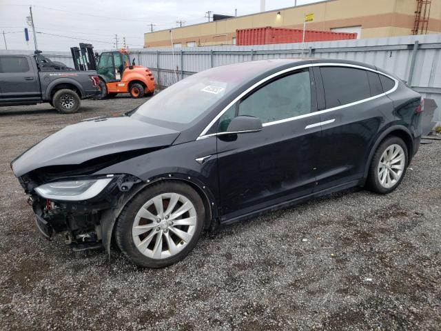 TESLA MODEL X 2019 with VIN 5YJXCDE23KF188055 - Photo from auction