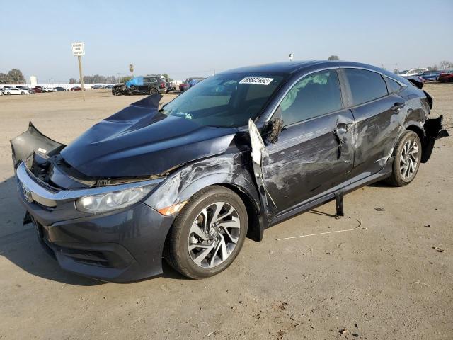 Photo 1 from auction – 2018 HONDA CIVIC EX with VIN 2HGFC2F70JH534793
