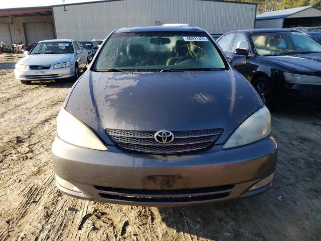 Photo 5 from auction – 2004 TOYOTA CAMRY LE with VIN 4T1BF30K74U572056
