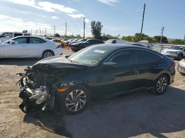 HONDA CIVIC EX 2018 with VIN 19XFC2F7XJE037969 - Photo from auction
