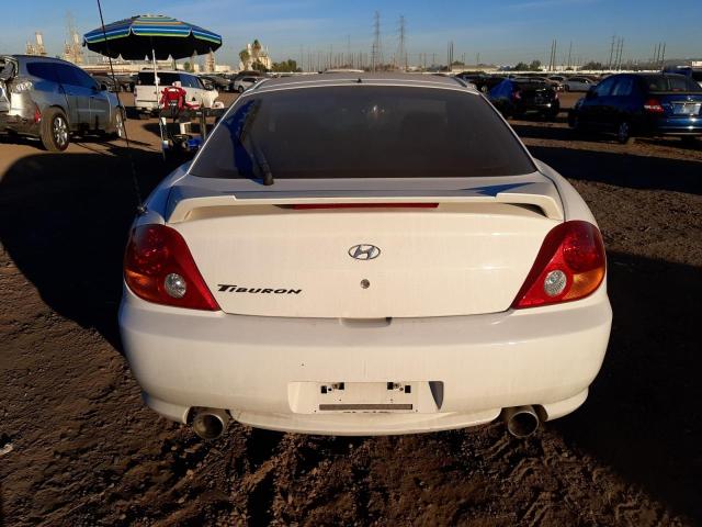Photo 6 from auction – 2003 HYUNDAI TIBURON with VIN KMHHM65DX3U096928