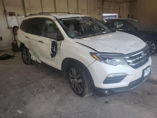 Photo 4 from auction – 2016 HONDA PILOT ELIT with VIN 5FNYF6H02GB004068