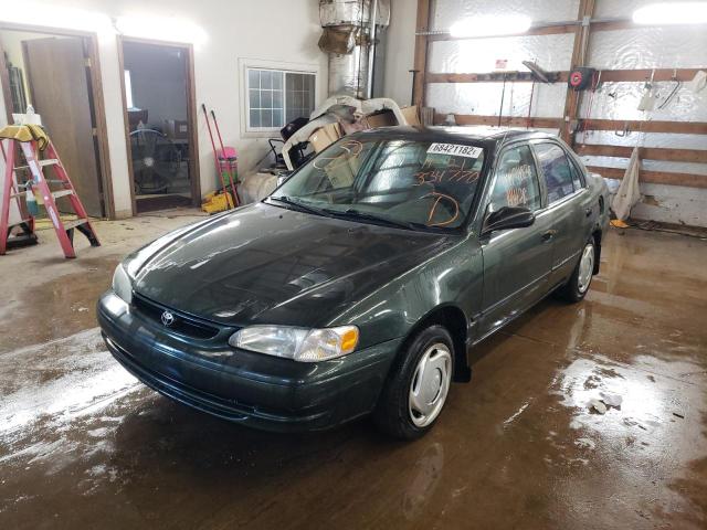 TOYOTA COROLLA VE 2000 with VIN 1NXBR12E0YZ334770 - Photo from auction