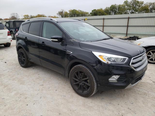 Photo 4 from auction – 2017 FORD ESCAPE TIT with VIN 1FMCU0J95HUD84310