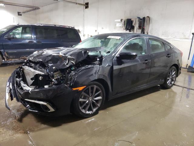 HONDA CIVIC EX 2021 with VIN 19XFC1F38ME010748 - Photo from auction