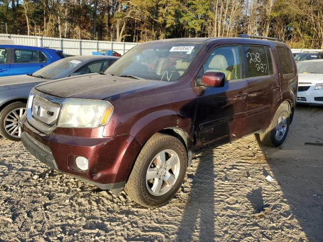 HONDA PILOT EXL 2011 with VIN 5FNYF4H59BB060114 - Photo from auction