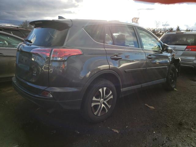 Photo 3 from auction – 2018 TOYOTA RAV4 LE with VIN JTMBFREV3JJ736717