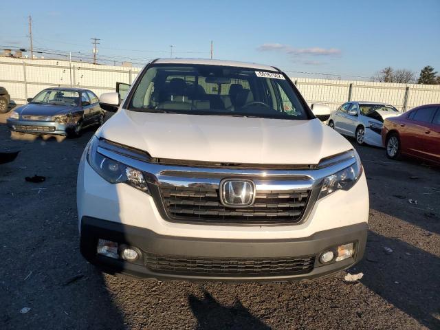 Photo 5 from auction – 2020 HONDA RIDGELINE with VIN 5FPYK3F50LB026693