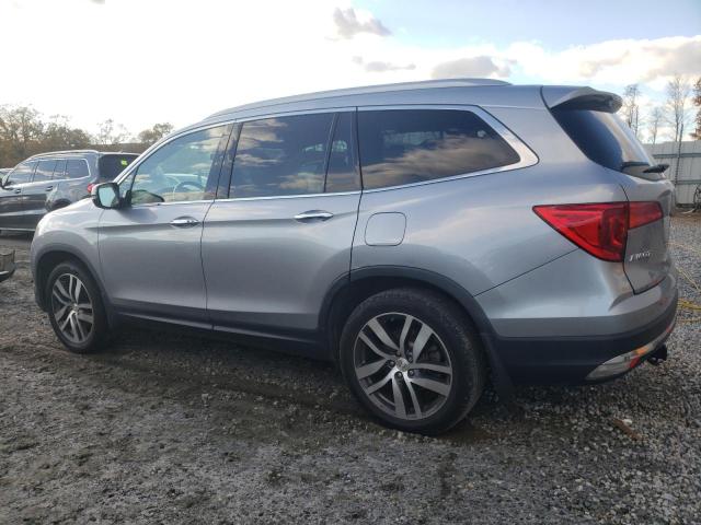 Photo 2 from auction – 2017 HONDA PILOT TOUR with VIN 5FNYF5H97HB016047