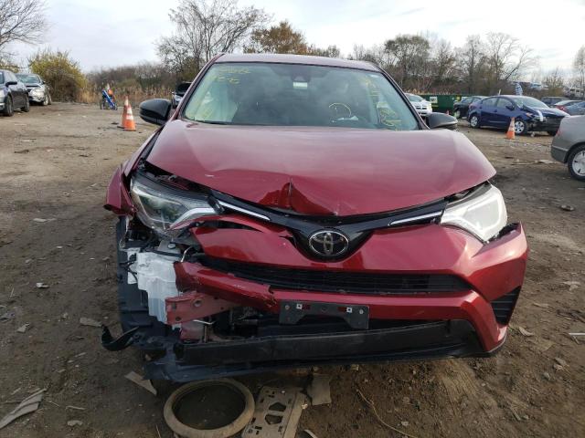 Photo 5 from auction – 2018 TOYOTA RAV4 LE with VIN 2T3BFREV0JW830734