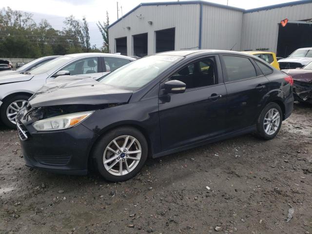 FORD FOCUS SE 2015 with VIN 1FADP3F2XFL202140 - Photo from auction