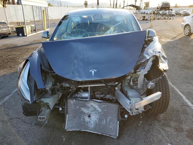 Photo 5 from auction – 2022 TESLA MODEL 3 with VIN 5YJ3E1EB2NF313283