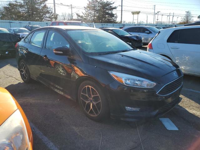 Photo 4 from auction – 2016 FORD FOCUS SE with VIN 1FADP3F20GL293193