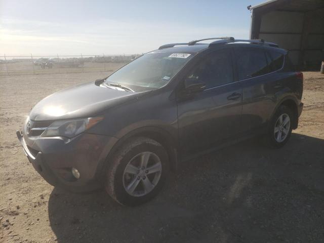 TOYOTA RAV4 XLE 2014 with VIN JTMWFREV7EJ008700 - Photo from auction