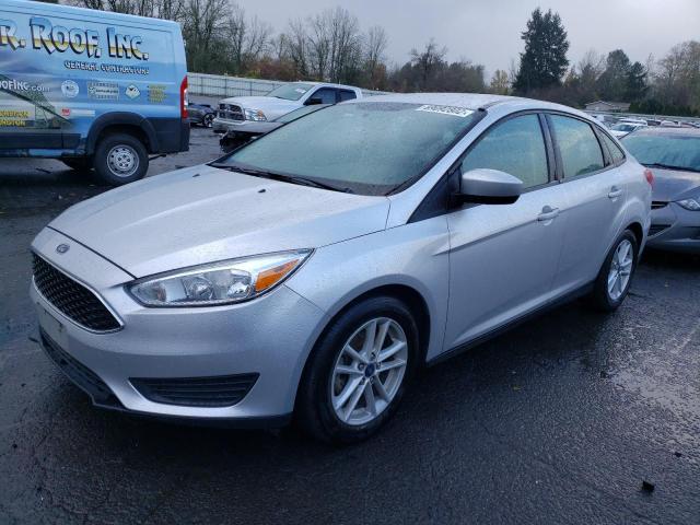 FORD FOCUS SE 2018 with VIN 1FADP3F24JL316451 - Photo from auction