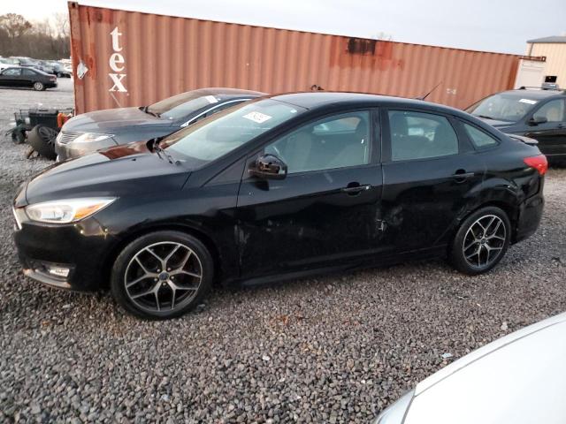 FORD FOCUS SE 2016 with VIN 1FADP3F22GL335220 - Photo from auction