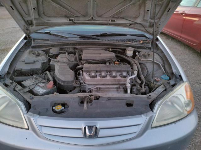 Photo 11 from auction – 2002 HONDA CIVIC LX with VIN 2HGES16632H557759