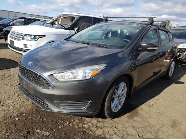 FORD FOCUS SE 2015 with VIN 1FADP3KE8FL267102 - Photo from auction