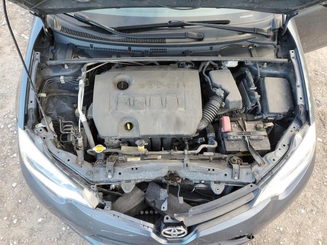 Photo 11 from auction – 2014 TOYOTA COROLLA L with VIN 2T1BURHE0EC156604