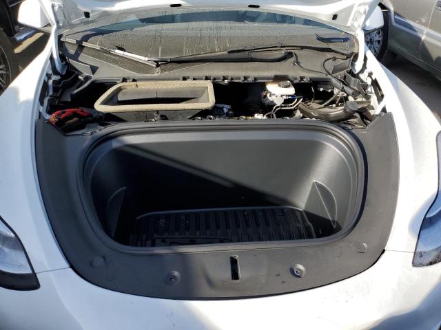 Photo 11 from auction – 2021 TESLA MODEL Y with VIN 5YJYGAEE3MF206512