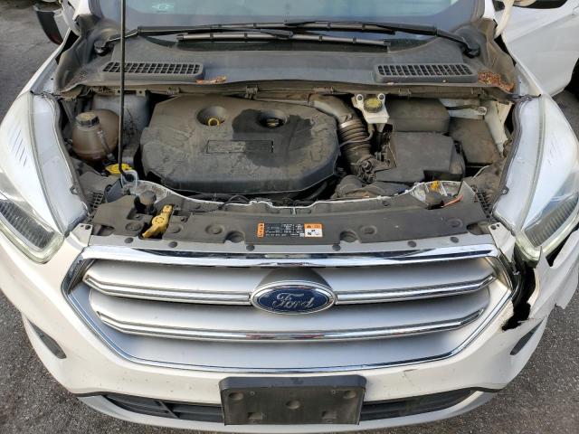 Photo 12 from auction – 2017 FORD ESCAPE TIT with VIN 1FMCU0J95HUA14863