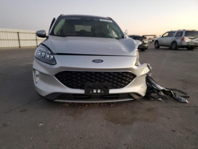 Photo 5 from auction – 2020 FORD ESCAPE TIT with VIN 1FMCU9DZ2LUB12872