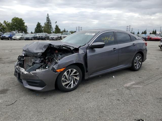 HONDA CIVIC EX 2018 with VIN 2HGFC2F75JH502910 - Photo from auction