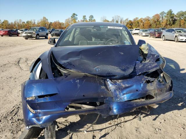 Photo 5 from auction – 2022 TESLA MODEL 3 with VIN 5YJ3E1EB6NF184674